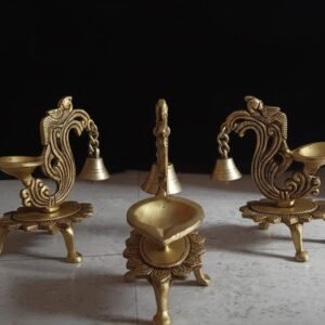 Handcrafted Brass Peacock Bell Diya (5 Inch) – Decorative Standing Oil Lamp with Hanging Bell and Tripod Floral Base
